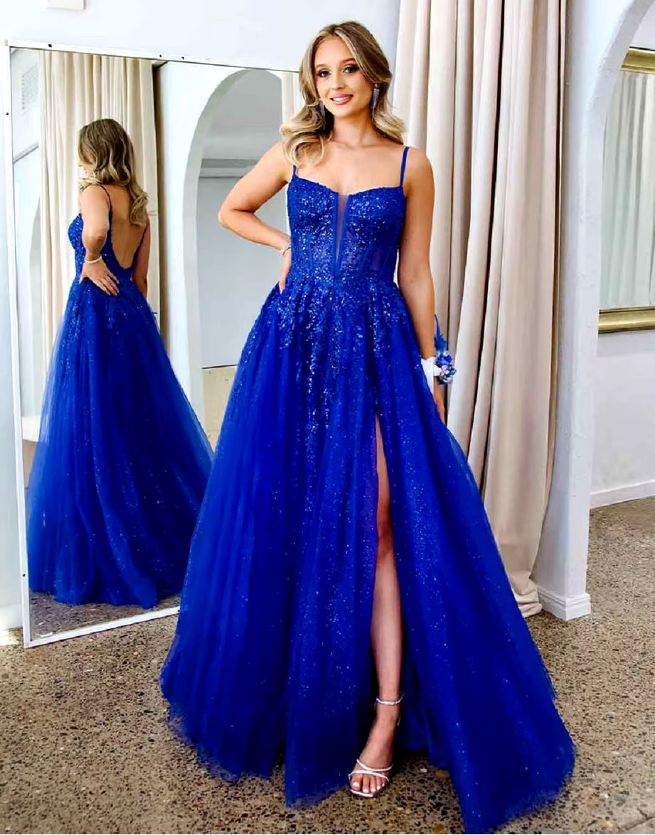 Royal blue lace prom dress with spaghetti straps and low back