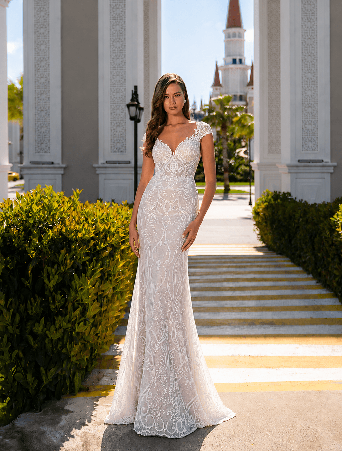 Colette - Fitted Wedding Dress - Size 8 on model, V neckline, off shoulder straps, off-white color.
