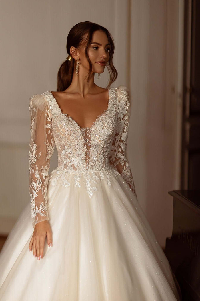 Corey Aline Tulle Wedding Dress featuring modern long sleeves and beaded lace details.