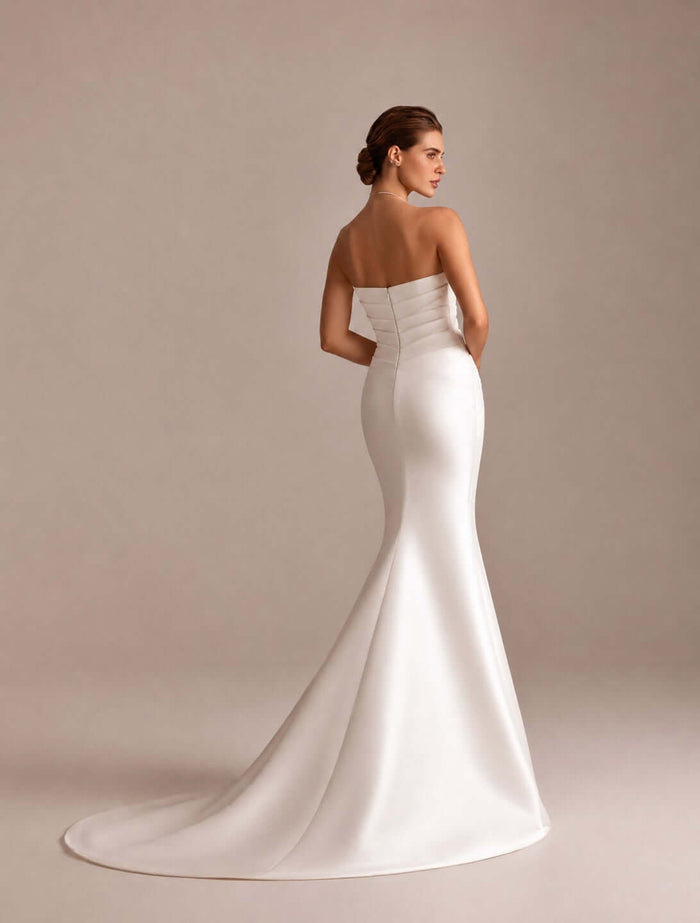 mermaid wedding dress, mikado wedding gown, cathedral train bridal dress, draped sweetheart neckline, fitted bridal silhouette, minimalist wedding gown, structured bridal corset, elegant satin bridal look, modern bridal fashion, timeless luxury wedding dress