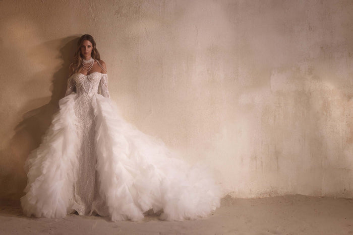 Beaded wedding dress, ivory wedding outfit, boutique in Ottawa, couture wedding gowns, wedding gown with sleeves, mermaid gown