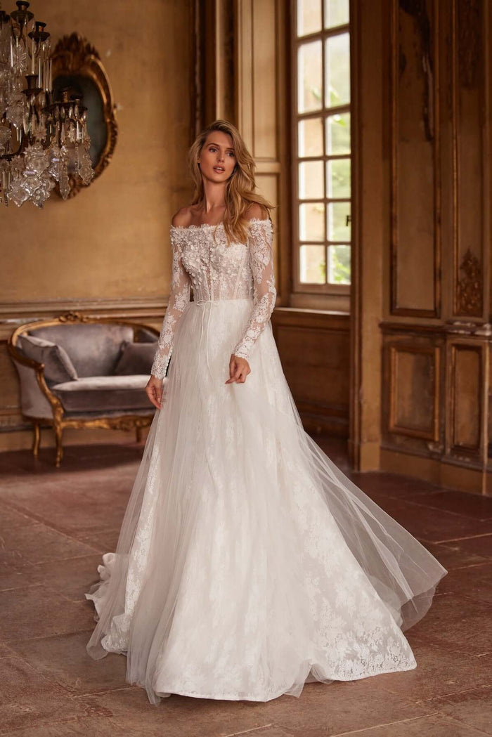 3D floral wedding dress

handmade floral details

lace flowers wedding gown

floral embroidered dress

wedding dress with 3D lace