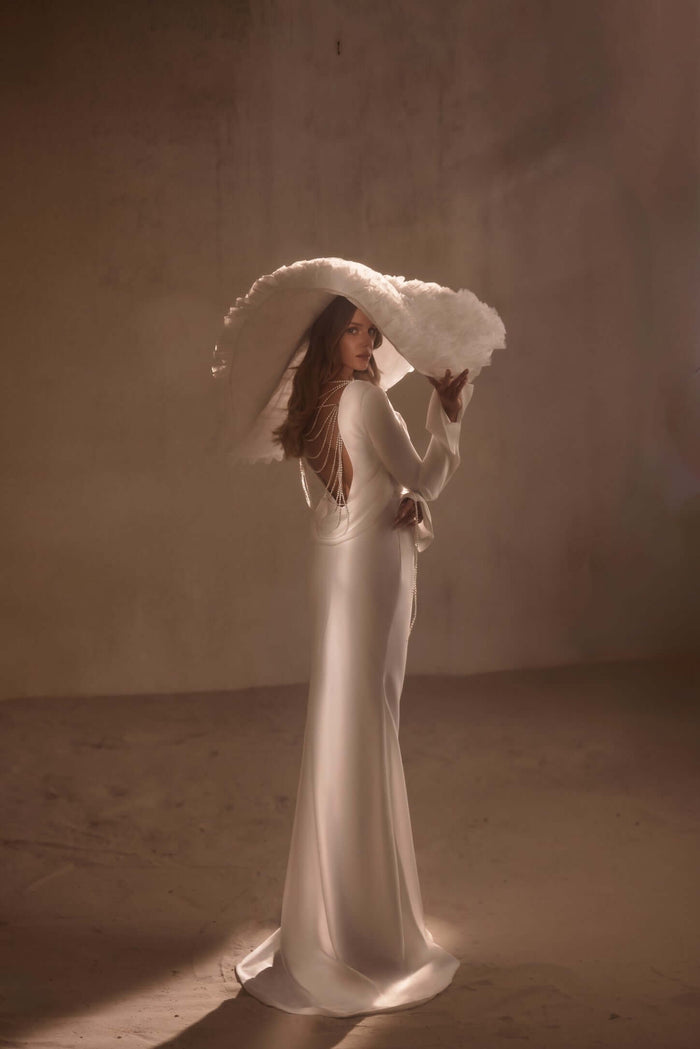 Back jewlery wedding dress, sparkle wedding dress detail, long sleeve wedding dress, trumpet sleeve wedding gown, mermaid wedding dress