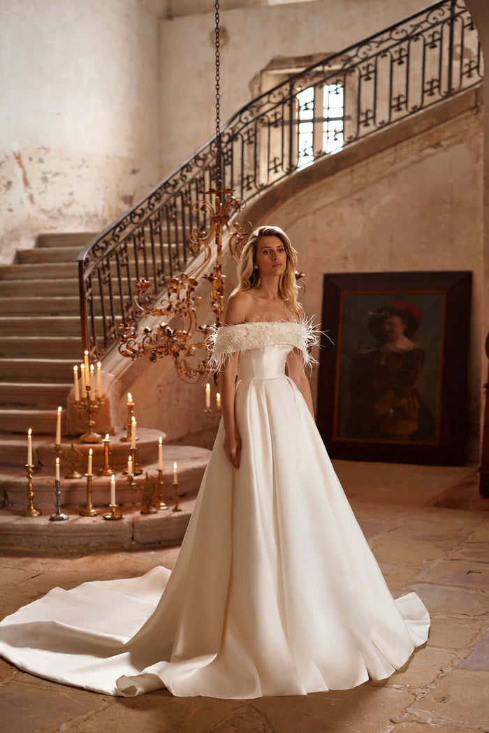 Margery simple mikado plain satin wedding dress featuring an ivory A-line silhouette and delicate off-shoulder design.