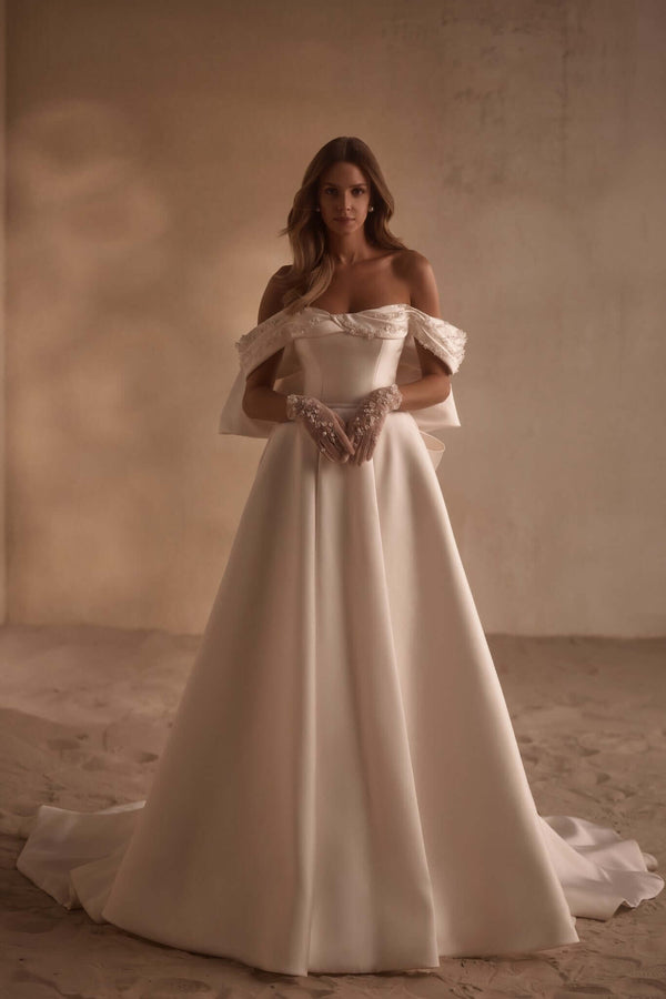  designer wedding dresses in orleans, designer wedding dresses in ottawa, designer wedding dresses near me,Shiny wedding dress, highest rated bridal boutiquem, big bow wedding dress, giant bow wedding dress, wedding ball gown,