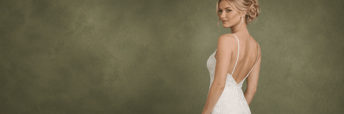 Bride in a low-back wedding dress for Poshfair Bridal FAQ in Ottawa