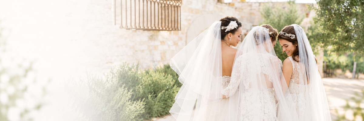 Brides wearing elegant wedding veils and bridal capes in Ottawa