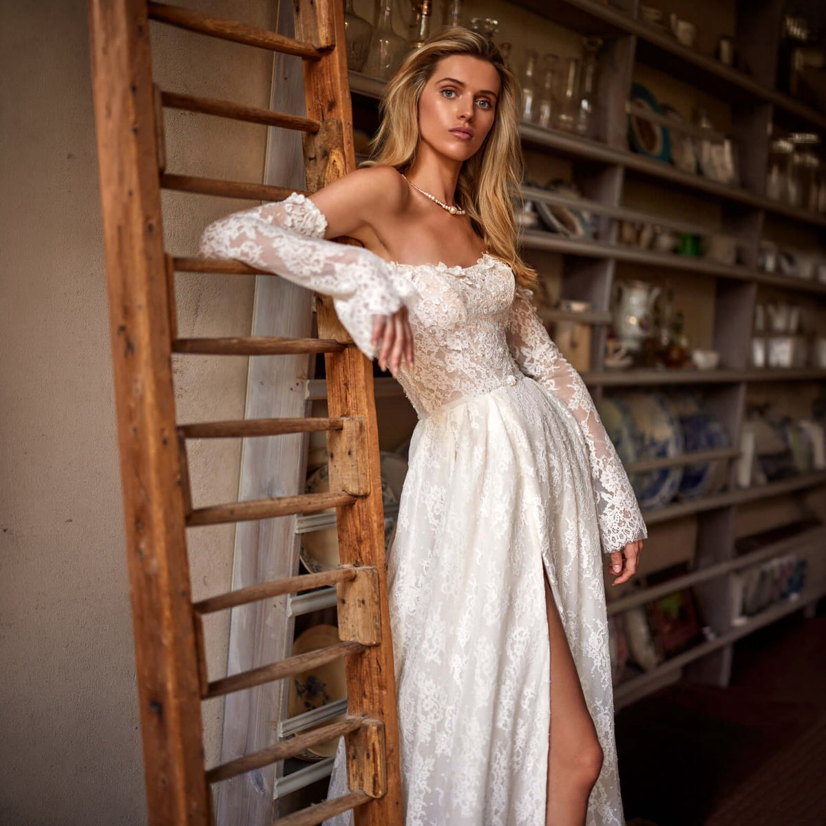 Bride wearing a custom lace wedding gown designed by Poshfair Bridal in Ottawa