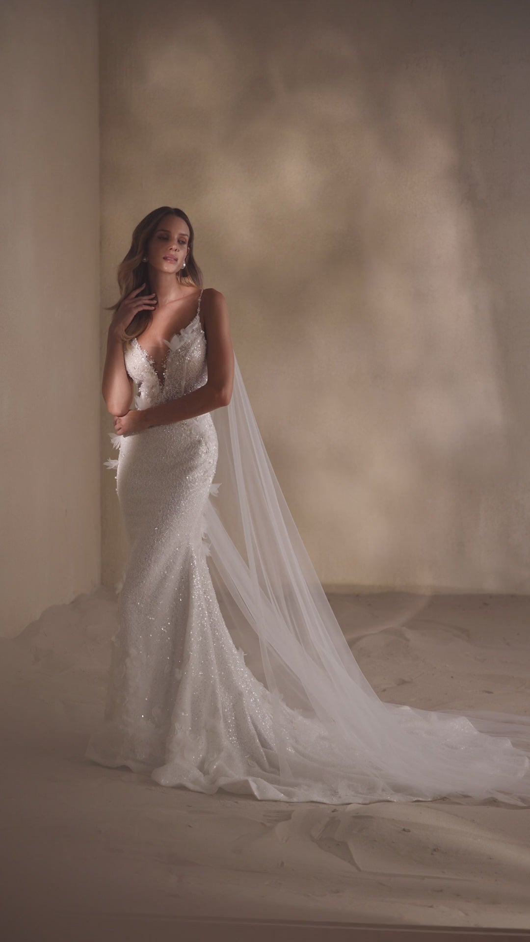 bridal boutique in orleans,
bridal boutique near me,
bridal boutiques near me,
unique wedding dress, pearl wedding dress, flowy wings wedding dress, deep v-neck wedding dress, mermaid wedding gown near me