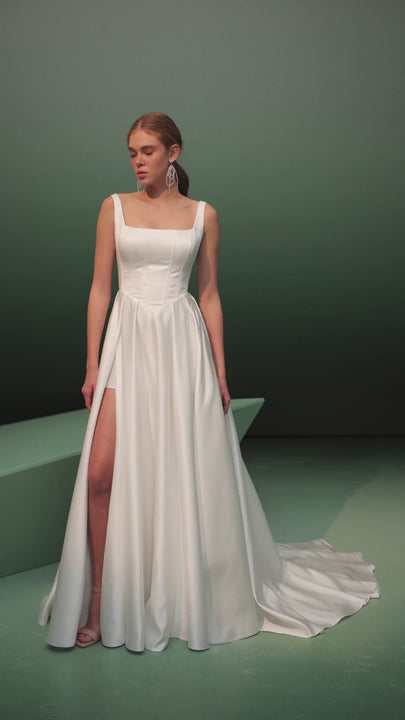 satin wedding dress, basque waist, long train, square neckline, structured corset bodice, minimalist bridal gown, A-line silhouette, elegant bridal fashion, modern wedding dress, timeless bridal elegance