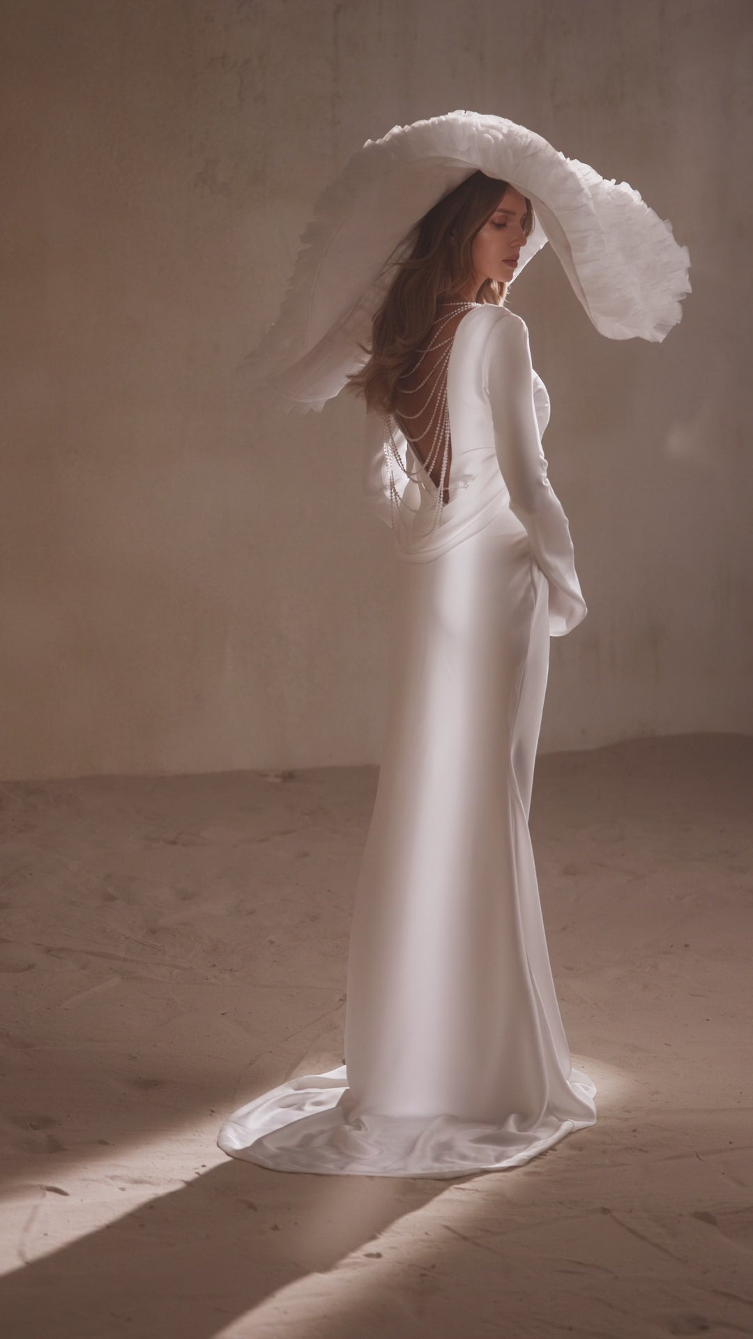 simple wedding style, bridal style, best rated bridal store near me, ivory wedding mermaid dress, long sleeve simple wedding dress, low back wedding gown