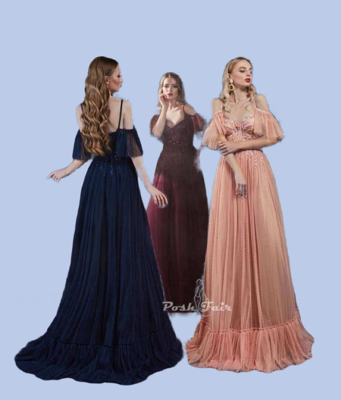 Showcasing tulle evening dress styles in navy blue and peach, featuring sweetheart neckline and spaghetti straps.