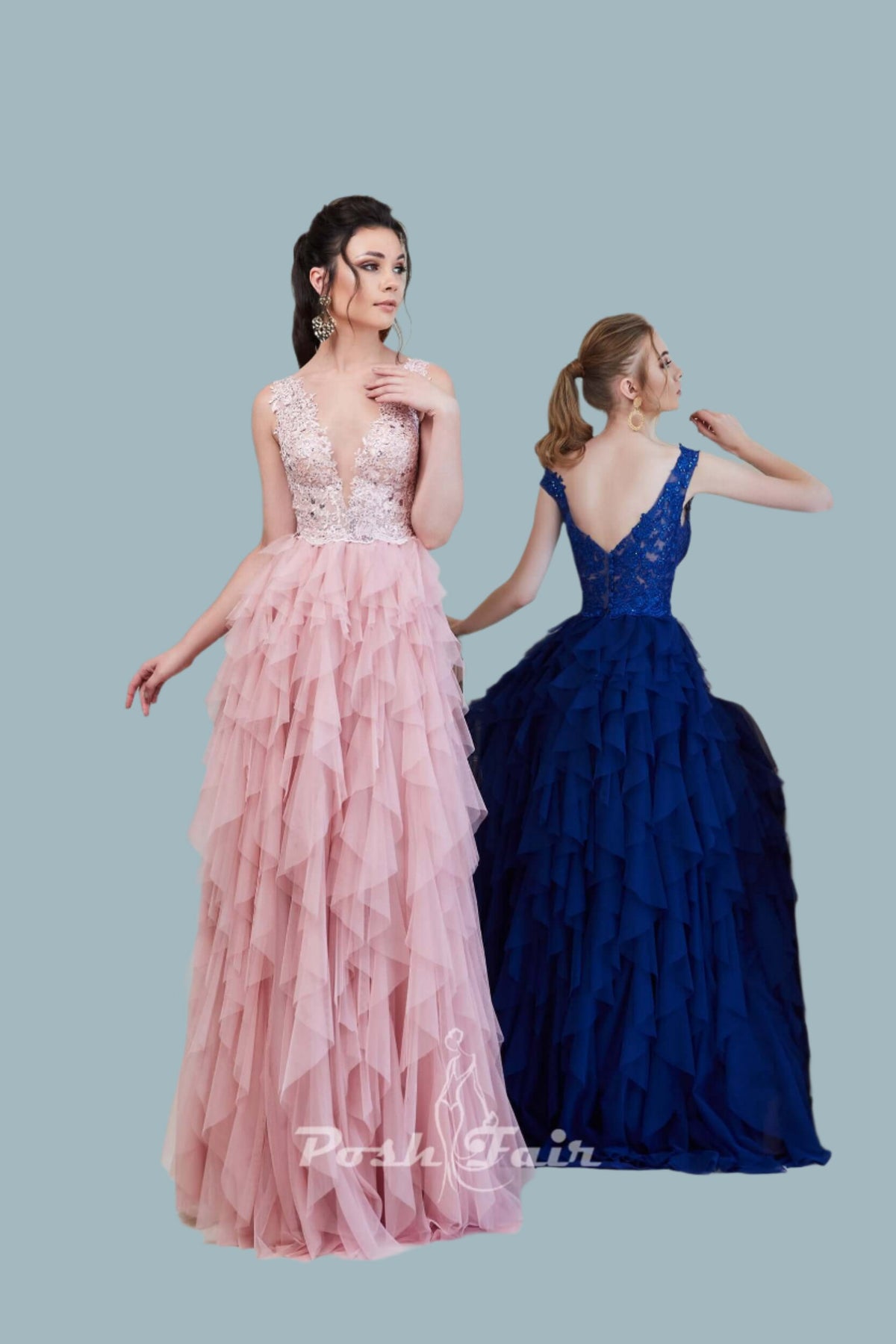 Two women modeling lace evening dresses, one in a pink Aline dress and the other in a blue layered tulle gown.